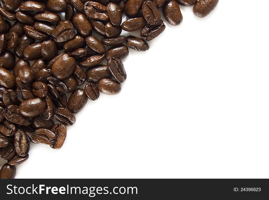 Studio image of fresh coffee beans arranged to create a frame with copy space. Studio image of fresh coffee beans arranged to create a frame with copy space.