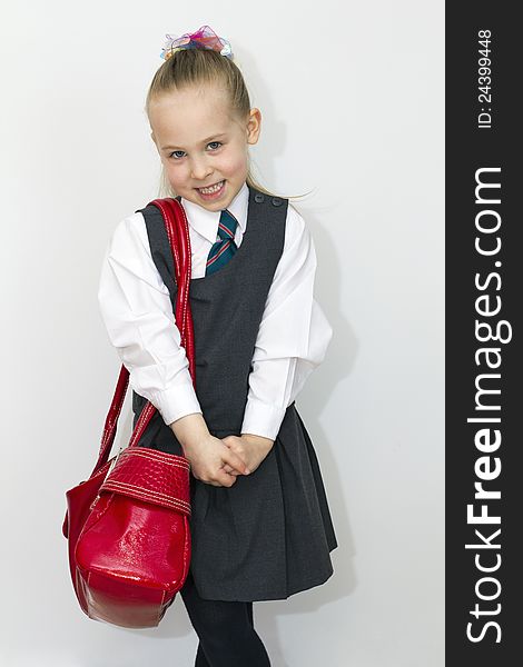 Little girl in a school uniform. Little girl in a school uniform