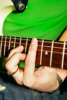 Fingers Of Guitar Player Royalty Free Stock Images