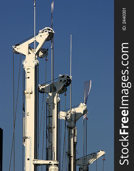 Heavy industry machines standing together on a blue sky. Heavy industry machines standing together on a blue sky