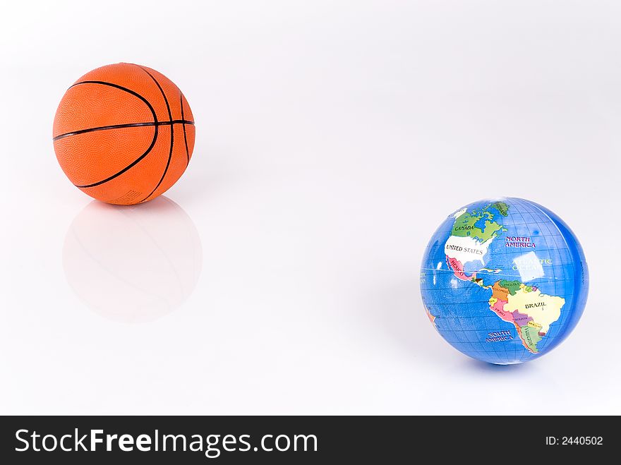 Basketball ball and the globe on a white background