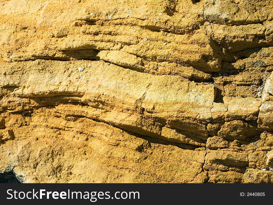 Sea stones under the sun on coast