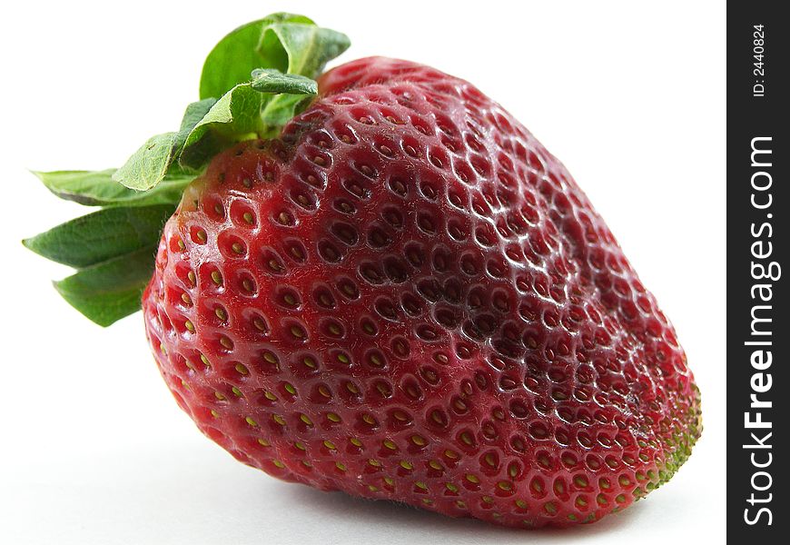 Macro photo of a strawberry against a white background