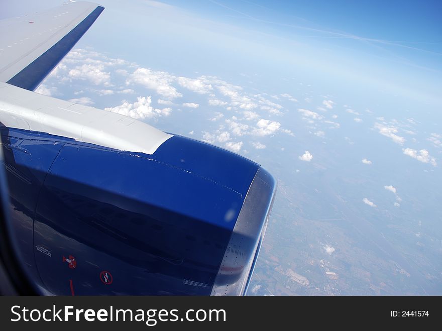 The wing and engine from an airplane. The wing and engine from an airplane