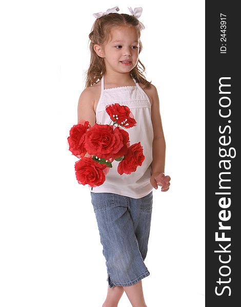 Little girl standing with flowers. Little girl standing with flowers