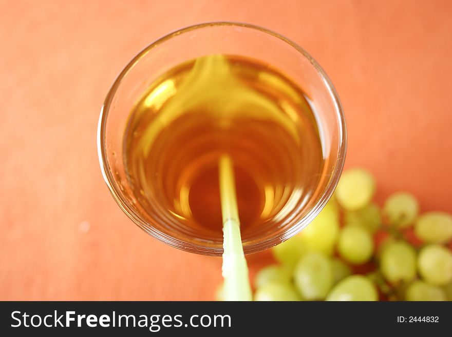 Glass of grape juice with straw. Glass of grape juice with straw