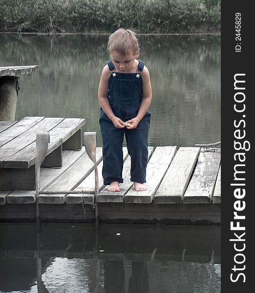 Little Boy On Dock