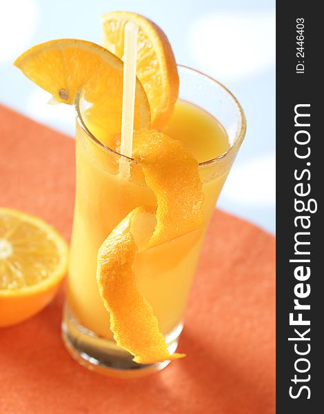 Glass of orange juice with straw. Glass of orange juice with straw