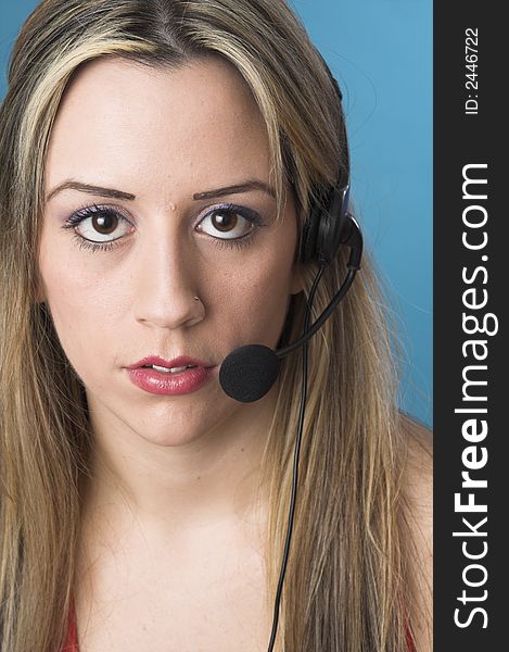 Portrait of receptionist with headset over blue drop