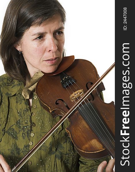 Mid-age woman playing violon over white background