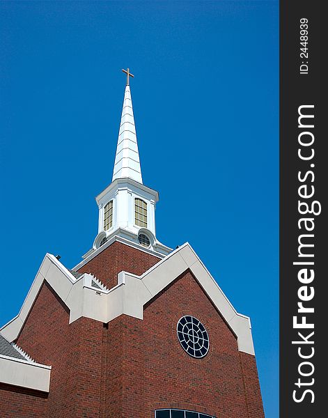 A decorative building in the blue sky background