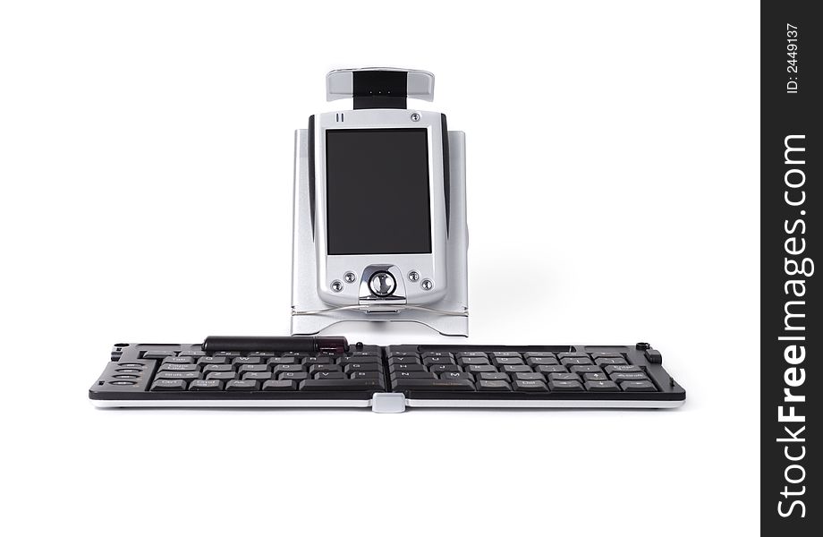 Pocket PC with remote infrared keyboard isolated over white background. Pocket PC with remote infrared keyboard isolated over white background