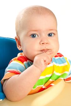 Little Baby Girl Is Sitting At The Table Royalty Free Stock Image Little Baby Girl Is Sitting At The Table Royalty Free Stock Image