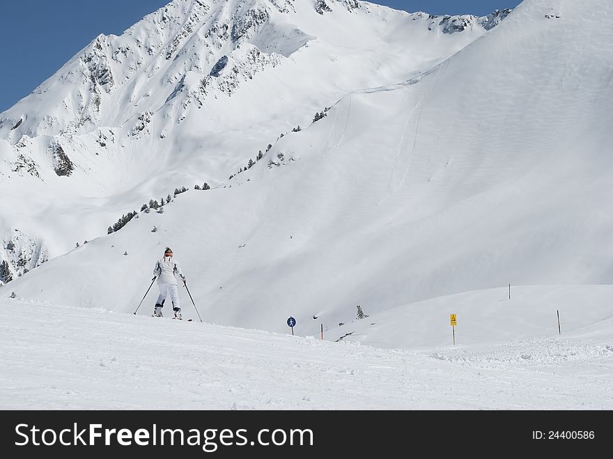 Loan skier on mountain in the Alps. Loan skier on mountain in the Alps