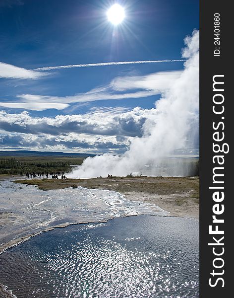 Icelands famous geyser Strokkur erupts. Nice shot at a sunny day. Icelands famous geyser Strokkur erupts. Nice shot at a sunny day