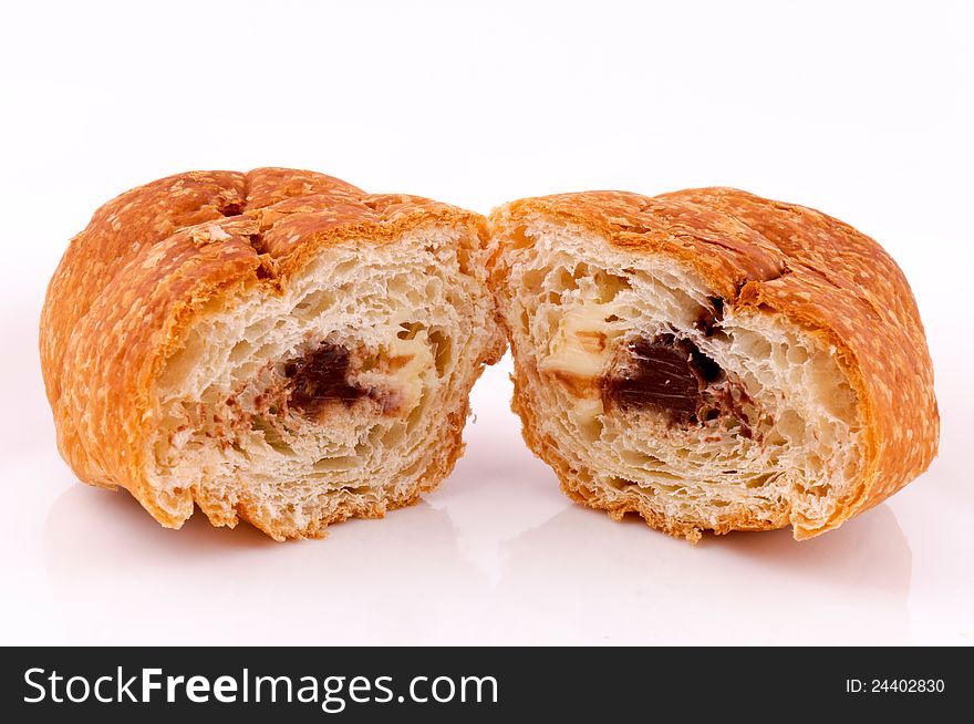 Croissant cut with chocolate and vanilla