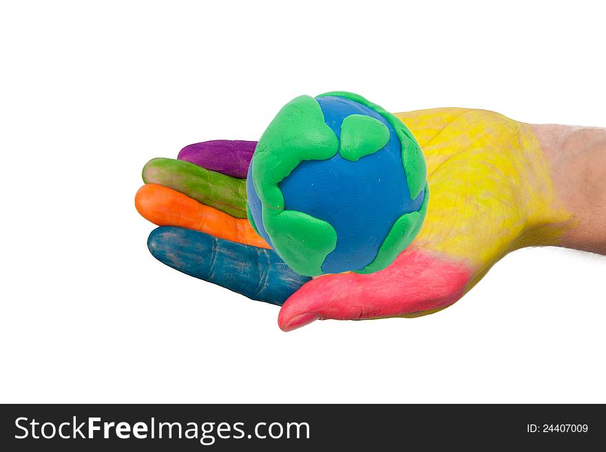 Colorful hand holding the palm made â€‹â€‹from clay earth globe. Isolated on white background with clipping path. Colorful hand holding the palm made â€‹â€‹from clay earth globe. Isolated on white background with clipping path