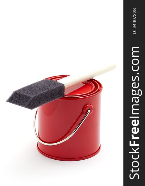 Red paint bucket and brush, on white background