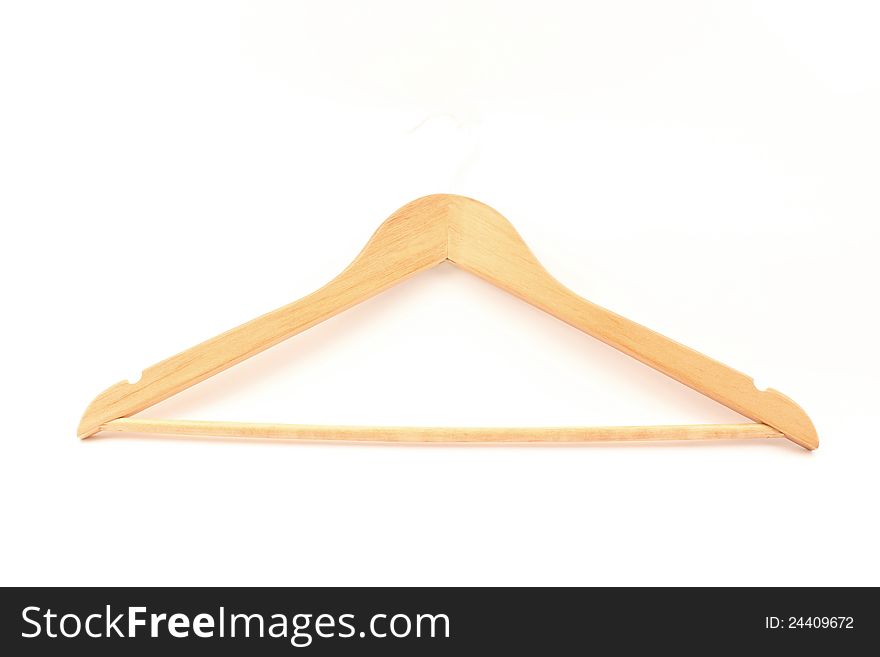 Subject wooden hanger isolated on a white background. Subject wooden hanger isolated on a white background.