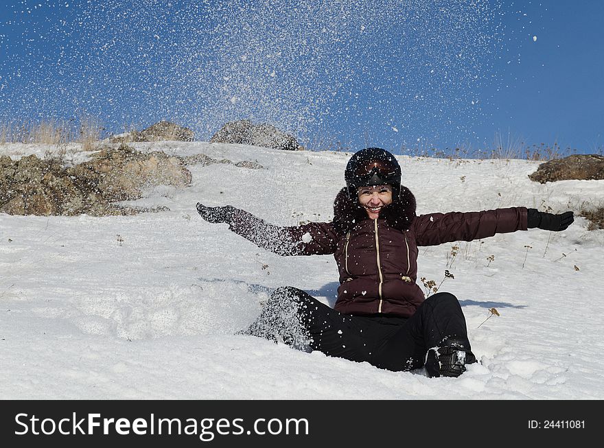 Young Woman In Mountain-skiing Clothes