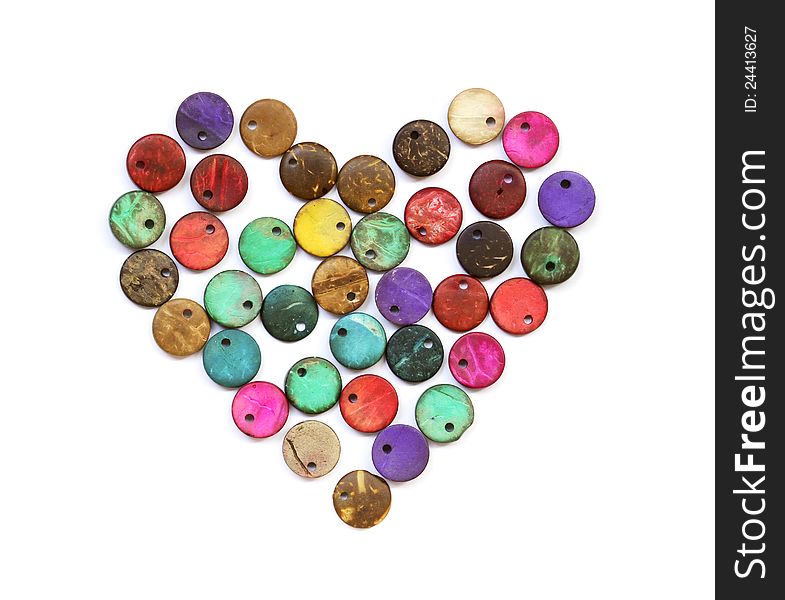 Pattern of heart shape from old colorful beads. Pattern of heart shape from old colorful beads