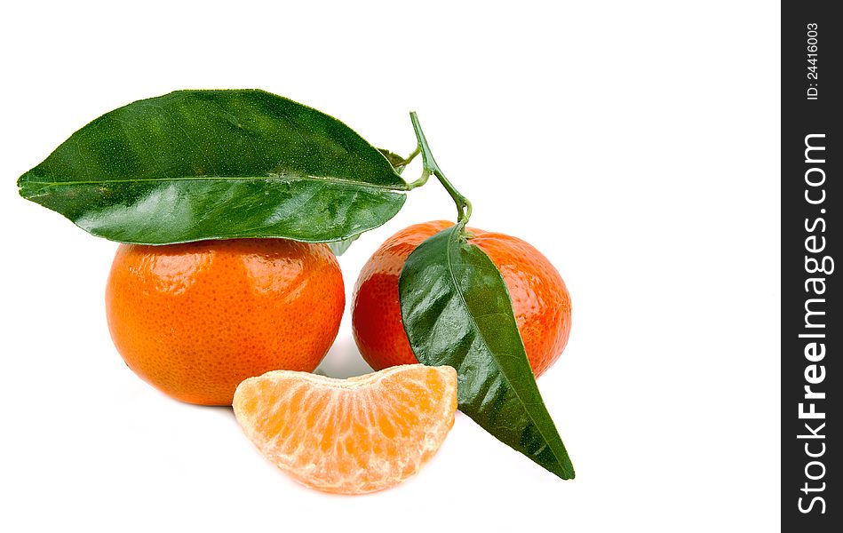 Fresh mandarin with leaf isolated on white. Fresh mandarin with leaf isolated on white