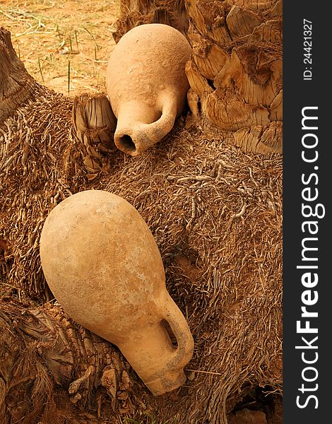 Two disposed of clay jars, morocco, village