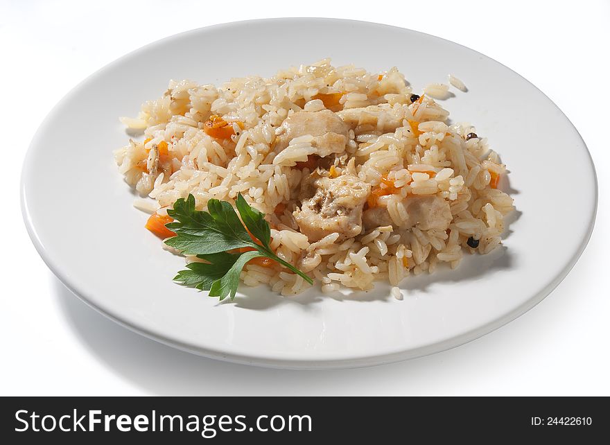 Pilau and pardley leaf on the white plate