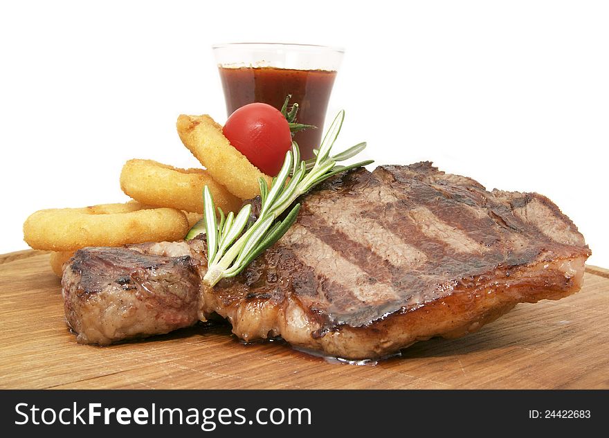 Steak sauce and greens on a white background. Steak sauce and greens on a white background