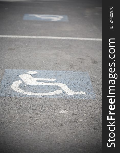 Handicap sign in an empty parking