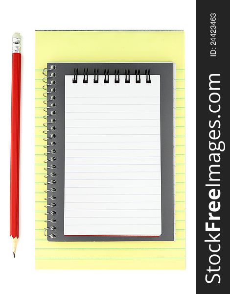 Notepads and pencil isolated on white