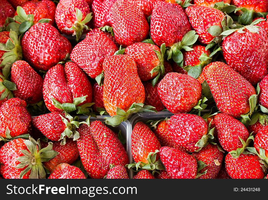 In the spring, market stalls are full of fresh organic strawberries