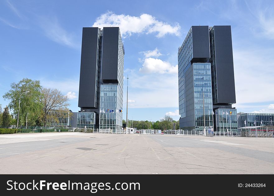 Twin towers in front of Baneasa exhibition center in Bucharest - the capital of Romania. Twin towers in front of Baneasa exhibition center in Bucharest - the capital of Romania