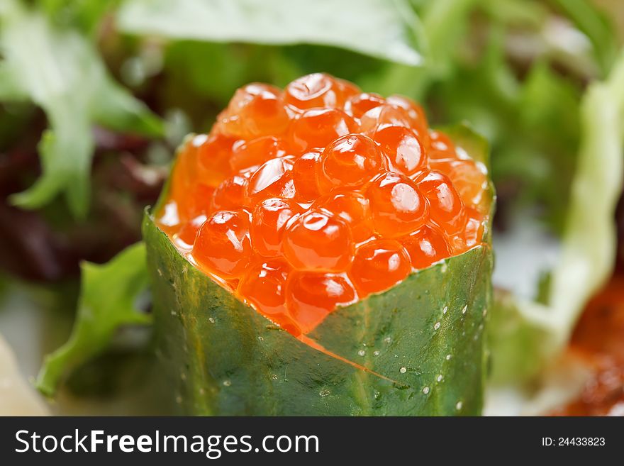 Red caviar with seafood and herbs