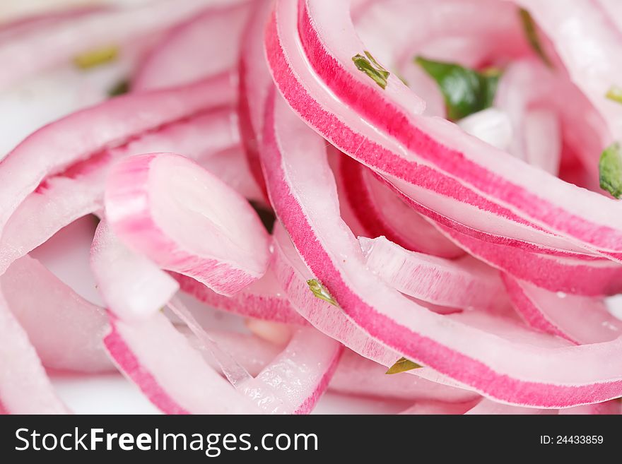 Sliced red onion, intended as a background image