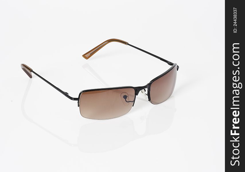 Sunglasses with reflection in white background