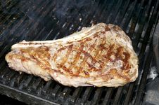 Steak On The Grill Stock Photos