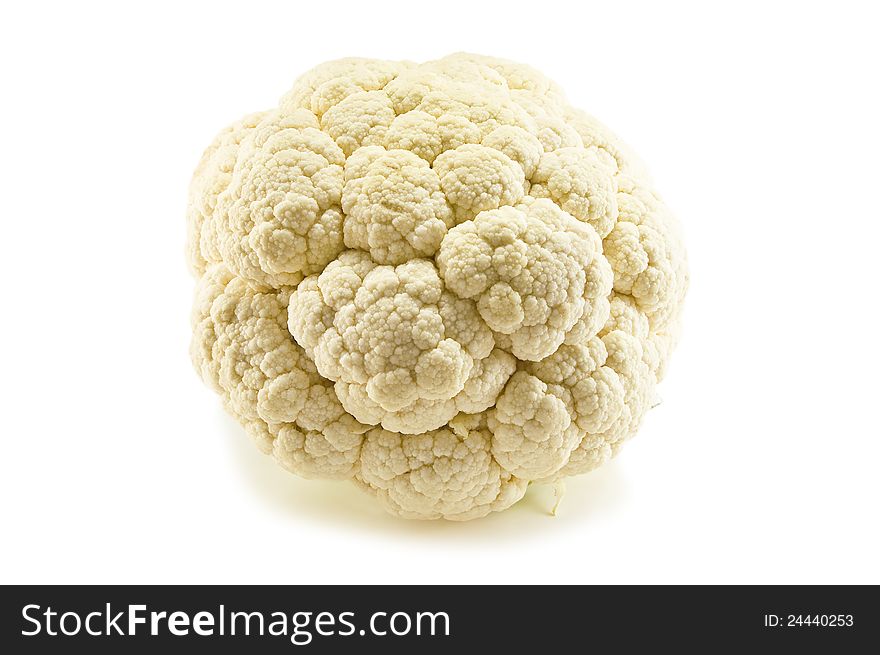 Head of raw cauliflower on white