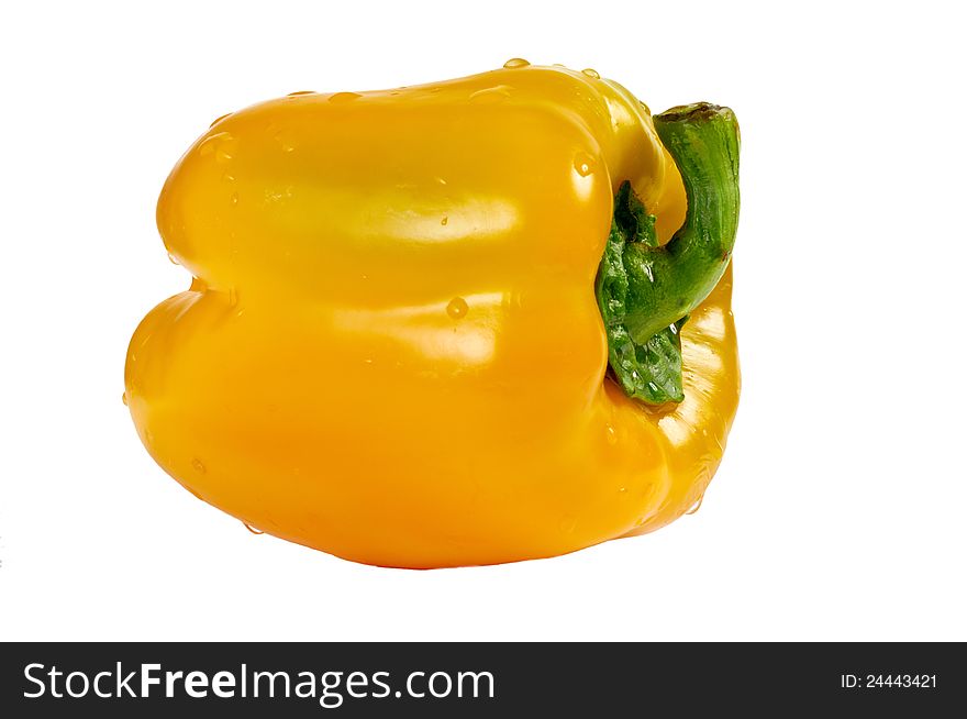 Isolated yellow pepper with water drops  on white background