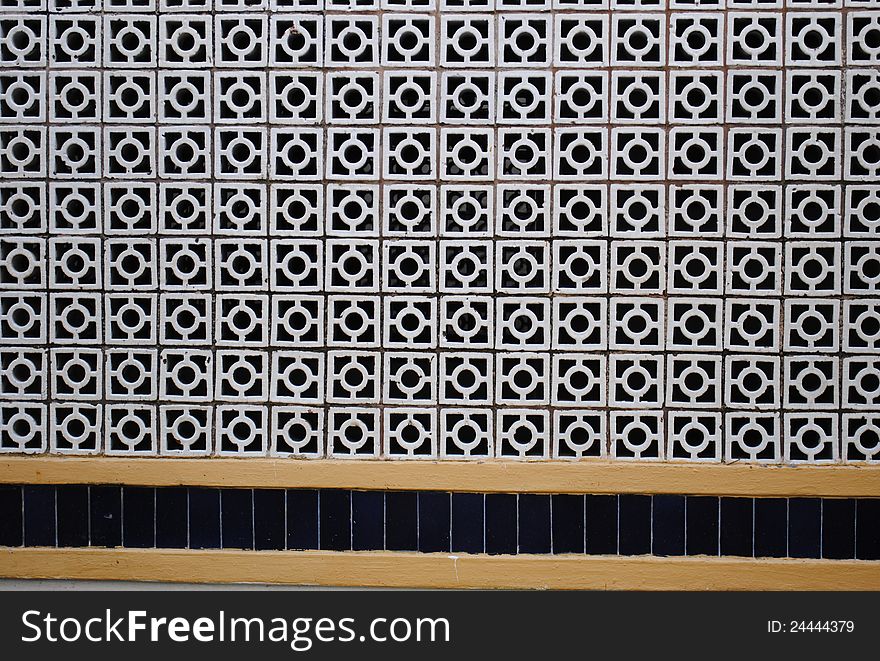 Shaped bricks wall with nice simmetry background wallpaper