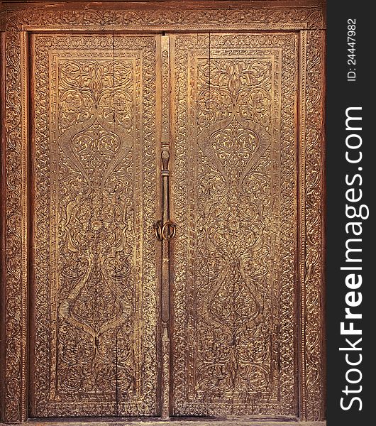 Handwork. Ancient wooden door. Handwork. Ancient wooden door.