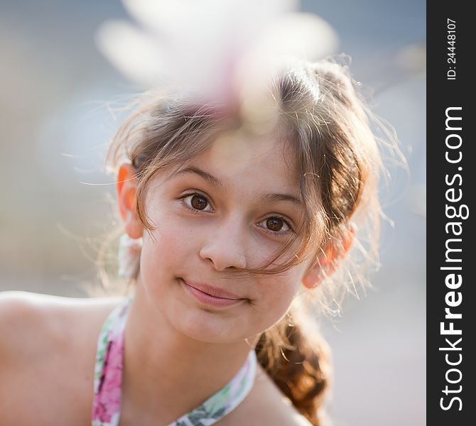 Pretty Young Girl Looks At Camera