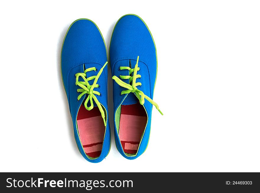 Pair of blue with green rope sneaker on white background. Pair of blue with green rope sneaker on white background