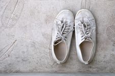 Old White Sneaker On Cement Floor Stock Images Old White Sneaker On Cement Floor Stock Images
