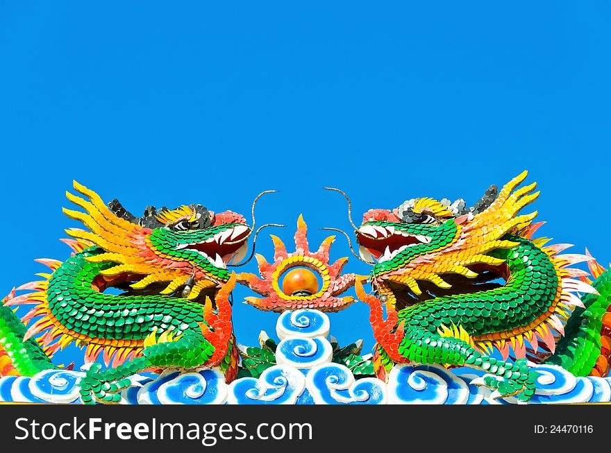 Twin chinese dragon in blue sky