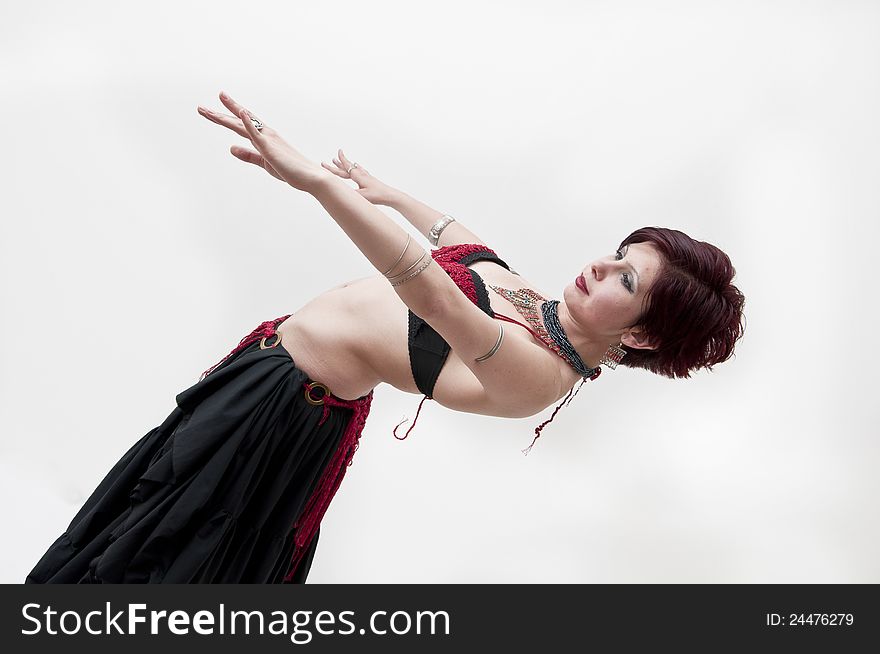 Beautiful tribal dancer photographed on white background. Beautiful tribal dancer photographed on white background