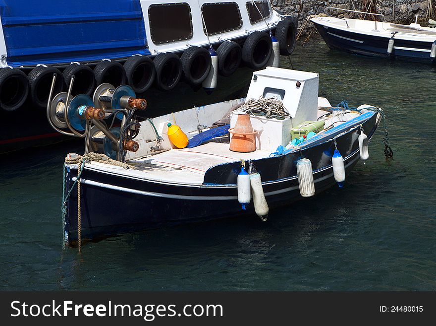 Traditional fishing boat at Santorini island in Greece. Traditional fishing boat at Santorini island in Greece