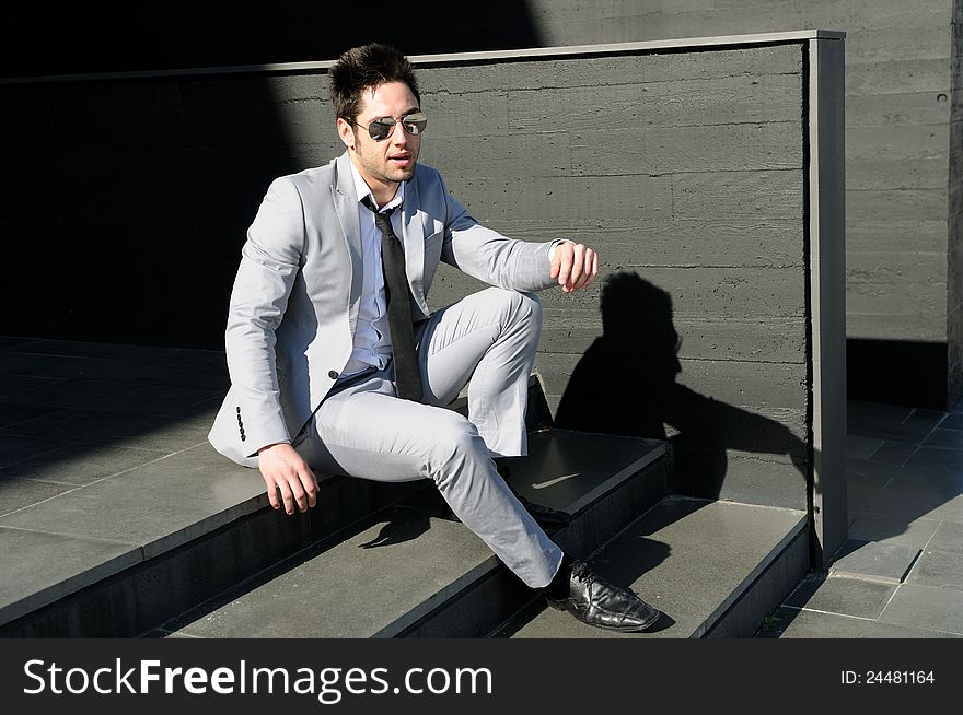 Attractive young businessman laughing