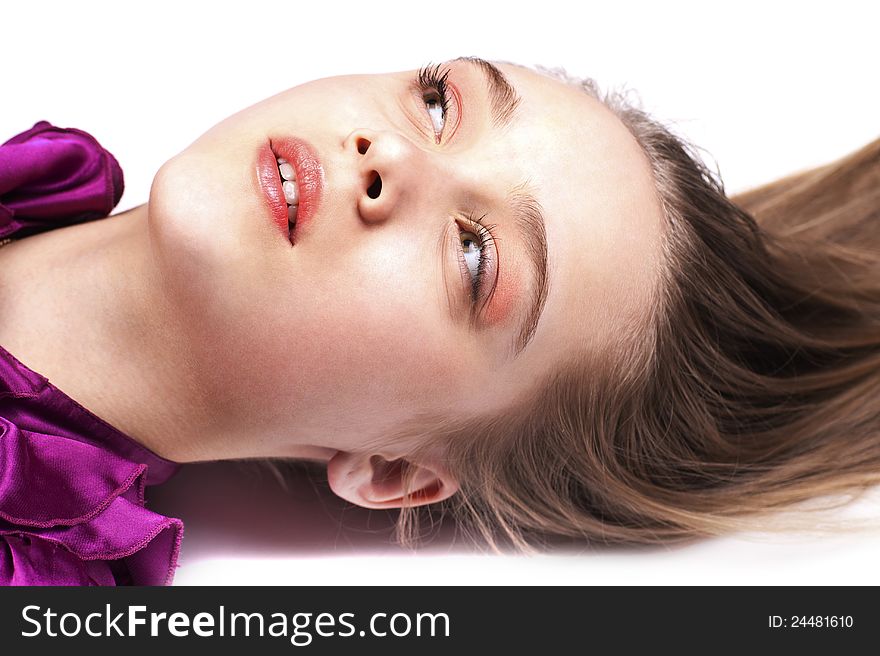 Sensual beautiful woman lying on the floor, close up