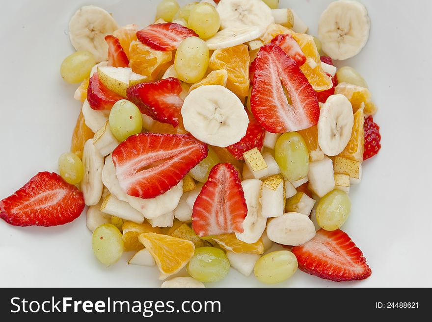 Fresh fruit salad in a white plate